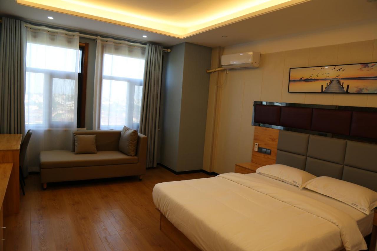 Hotel Anhui Ломе Экстерьер фото