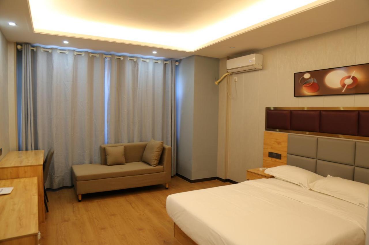 Hotel Anhui Ломе Экстерьер фото