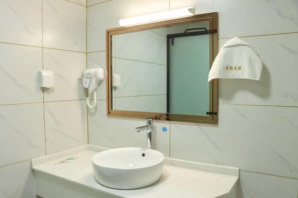 Hotel Anhui Ломе Экстерьер фото
